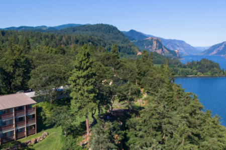 drone view of Westcliff Lodge above the Columbia River