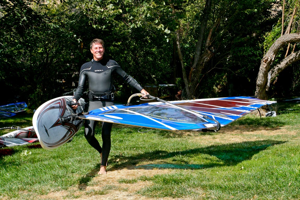 Steve gets ready to windsurf at Doug's Beach