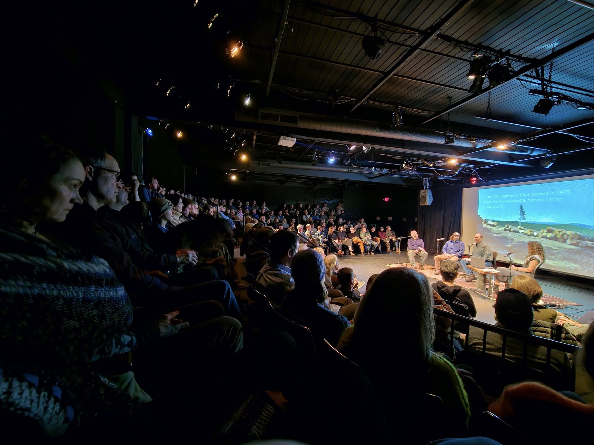 Community members learn about the history of trail building in Hood River, OR