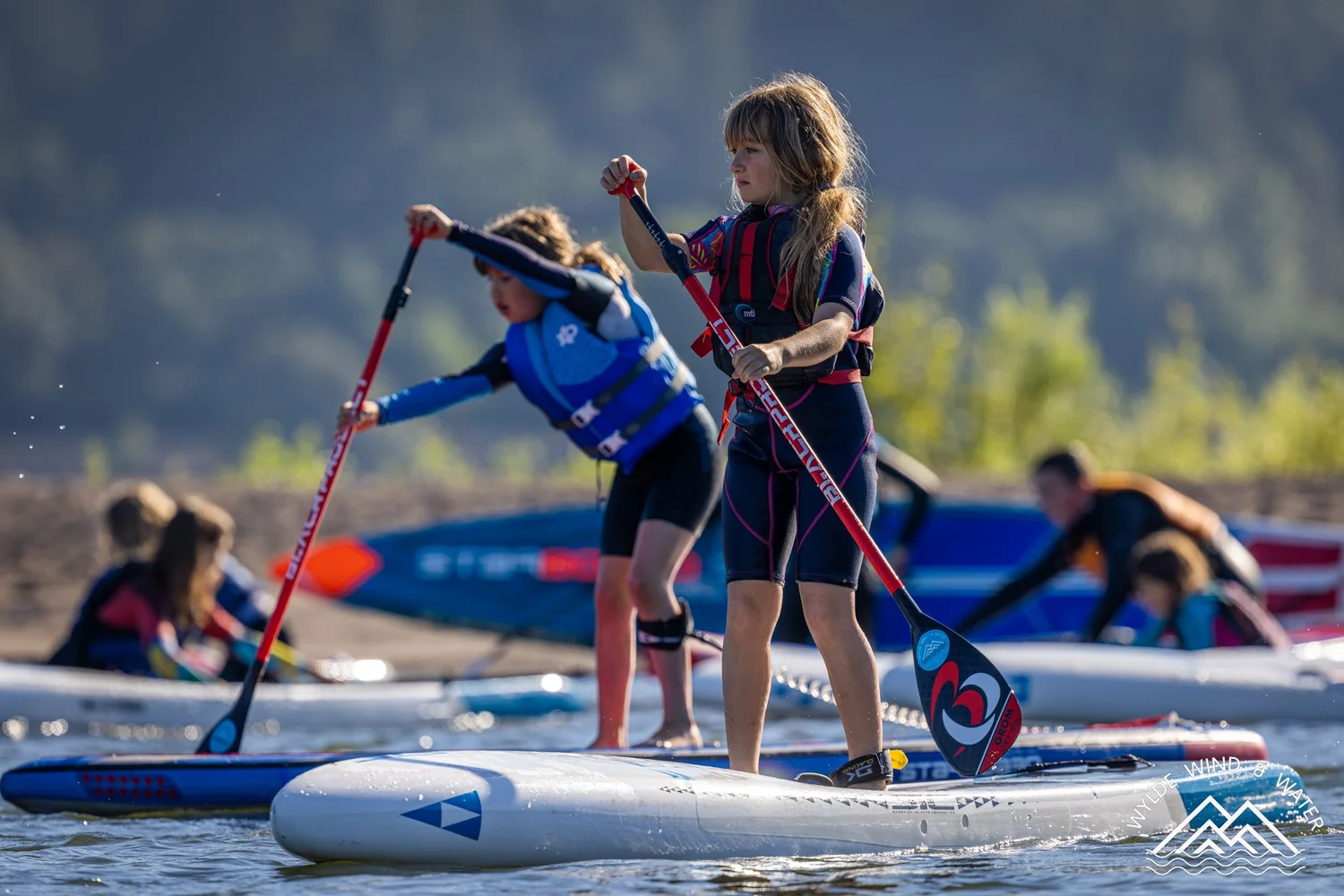 Paddle board racers